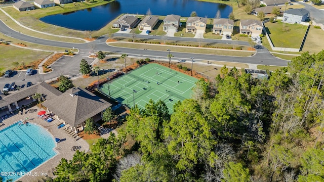 aerial view with a residential view and a water view