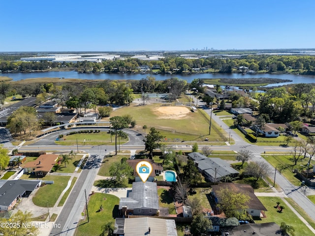 drone / aerial view with a water view