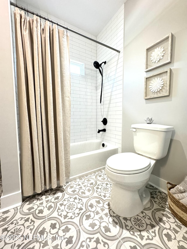 full bathroom with tile patterned floors, baseboards, toilet, and shower / tub combo with curtain