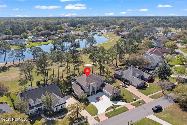 bird's eye view with a residential view and a water view