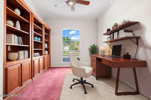 office featuring light colored carpet, baseboards, crown molding, and ceiling fan