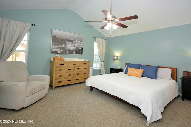 carpeted bedroom with a ceiling fan and lofted ceiling