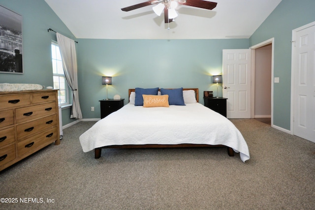 carpeted bedroom with baseboards, ceiling fan, and lofted ceiling