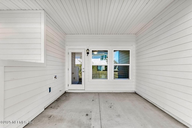 entrance to property with a patio area