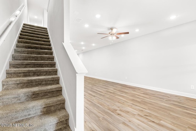staircase with visible vents, recessed lighting, ceiling fan, and wood finished floors