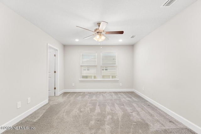 carpeted empty room with recessed lighting, visible vents, baseboards, and ceiling fan