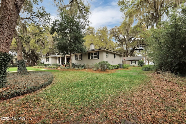 3079 Anderson Rd, Green Cove Springs, FL 32043 - single story home featuring a chimney and a front lawn