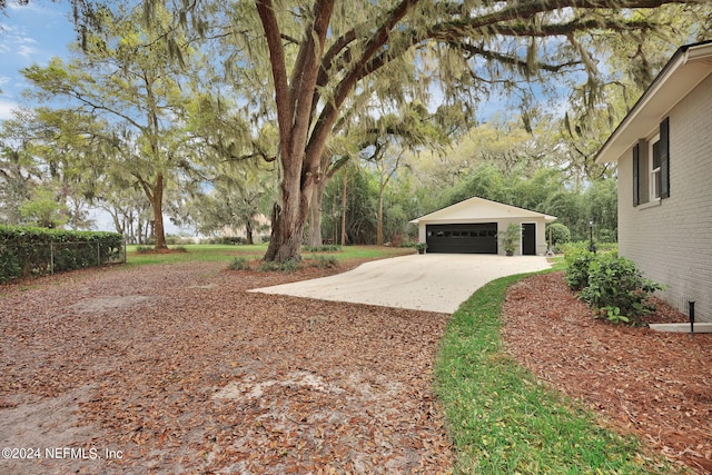3079 Anderson Rd, Green Cove Springs, FL 32043 - view of yard with a garage and an outdoor structure