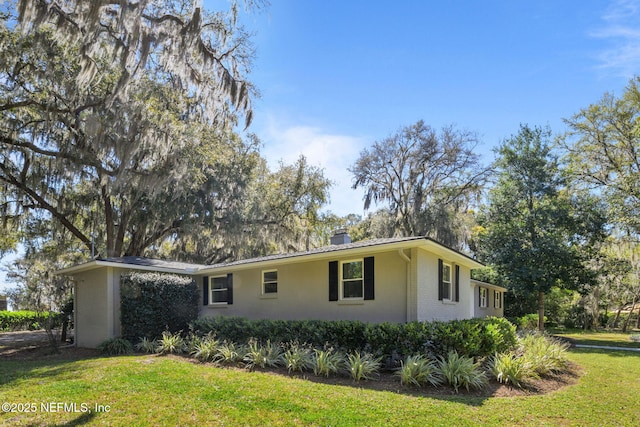 3079 Anderson Rd, Green Cove Springs, FL 32043 - view of front of house featuring a front lawn and brick siding