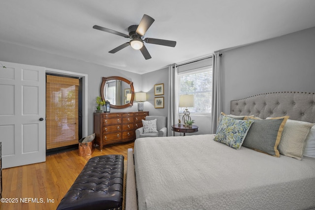 3079 Anderson Rd, Green Cove Springs, FL 32043 - bedroom with a ceiling fan and wood finished floors