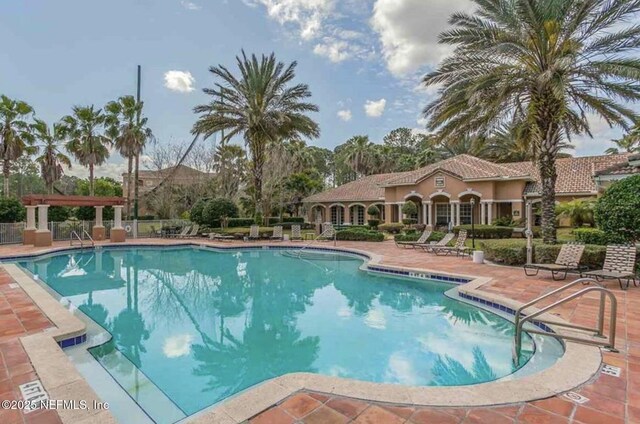 615 Fairway Dr Unit 202, Saint Augustine, FL 32084 - community pool with a patio