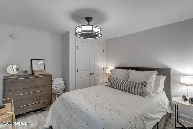 726 Spinnakers Reach Dr Unit 726, Ponte Vedra Beach, FL 32082 - bedroom with light wood-style flooring