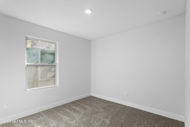 1539 E 26th St, Jacksonville, FL 32206 - empty room with baseboards and carpet floors