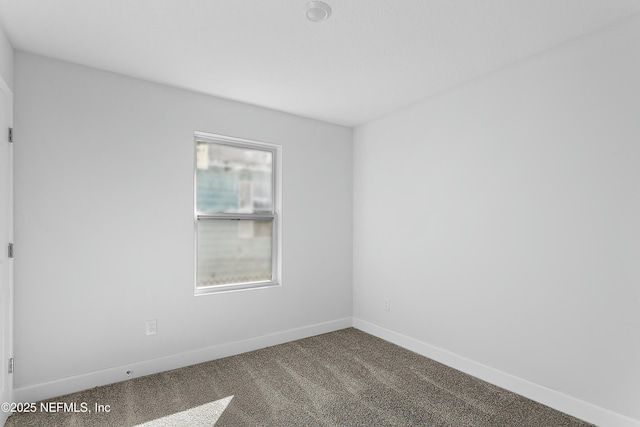 1539 E 26th St, Jacksonville, FL 32206 - empty room featuring carpet and baseboards