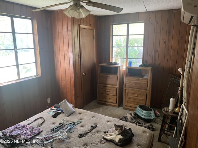 7823 Berry Ave, Jacksonville, FL 32211 - bedroom featuring multiple windows, wood walls, and a textured ceiling