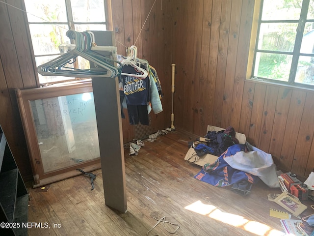 7823 Berry Ave, Jacksonville, FL 32211 - clothes washing area featuring hardwood / wood-style flooring and wood walls