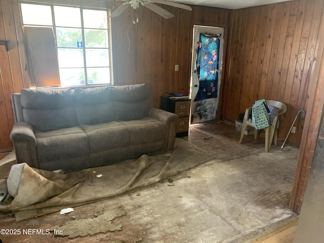 7823 Berry Ave, Jacksonville, FL 32211 - living room with wooden walls and a ceiling fan