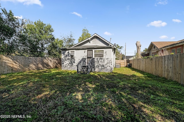view of outbuilding with a fenced backyard