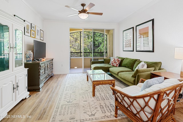 8539 Gate Pkwy W Unit 628, Jacksonville, FL 32216 - living room with light wood finished floors, ceiling fan, and ornamental molding