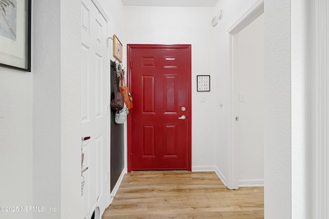 8539 Gate Pkwy W Unit 628, Jacksonville, FL 32216 - hall with baseboards and light wood finished floors