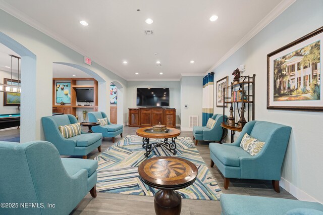 8539 Gate Pkwy W Unit 628, Jacksonville, FL 32216 - living area with recessed lighting, arched walkways, visible vents, and ornamental molding
