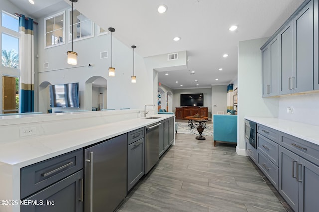 8539 Gate Pkwy W Unit 628, Jacksonville, FL 32216 - kitchen with recessed lighting, visible vents, appliances with stainless steel finishes, and open floor plan