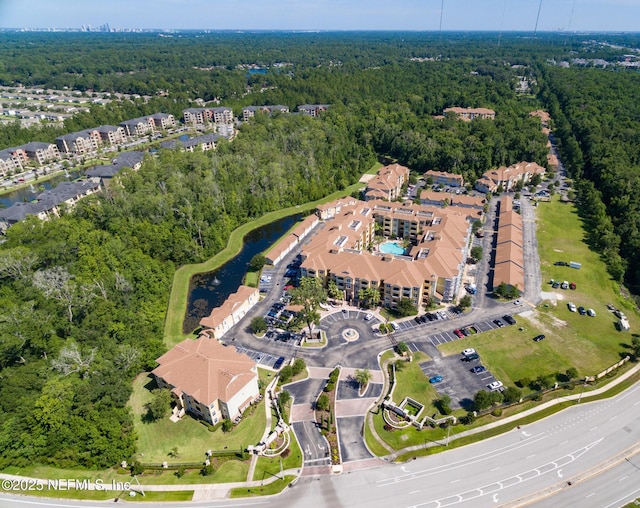8539 Gate Pkwy W Unit 628, Jacksonville, FL 32216 - aerial view with a wooded view and a water view