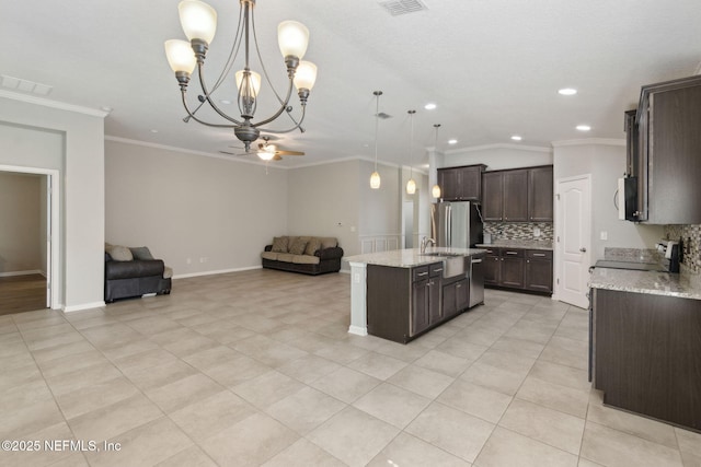 79 Boulder Rock Way, Saint Augustine, FL 32092 - kitchen featuring open floor plan, ceiling fan, appliances with stainless steel finishes, dark brown cabinets, and recessed lighting