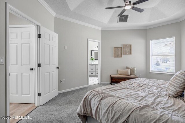 95332 Village Dr, Fernandina Beach, FL 32034 - bedroom with visible vents, ornamental molding, a textured ceiling, connected bathroom, and baseboards