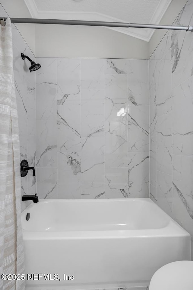 95332 Village Dr, Fernandina Beach, FL 32034 - full bathroom featuring toilet, shower / bath combo, and ornamental molding