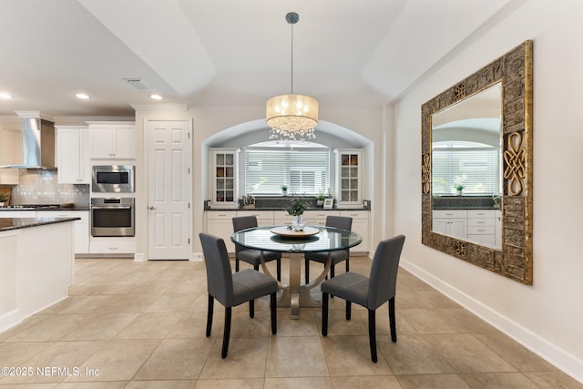 dining room featuring light tile patterned floors, baseboards, visible vents, recessed lighting, and an inviting chandelier