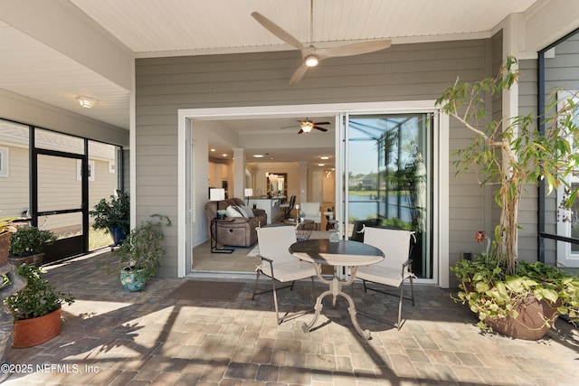 view of patio / terrace with a ceiling fan