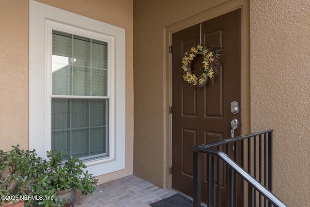 11856 Surfbird Cir Unit 41E, Jacksonville, FL 32256 - property entrance with stucco siding