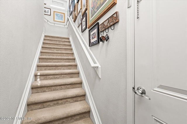 11856 Surfbird Cir Unit 41E, Jacksonville, FL 32256 - stairs featuring a textured wall