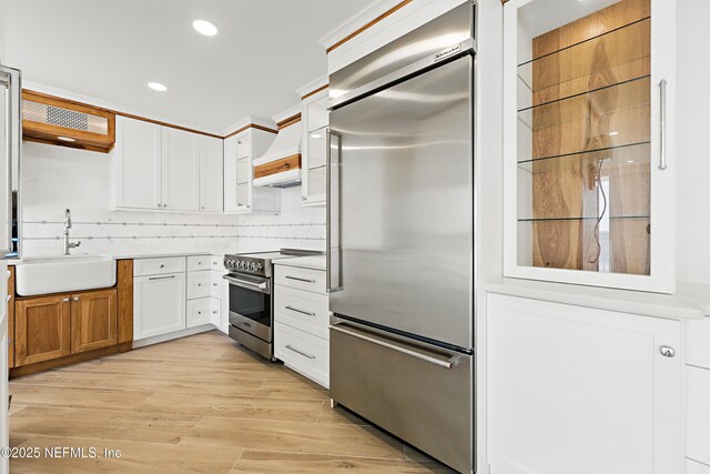 1601 Ocean Dr S Unit 410, Jacksonville Beach, FL 32250 - kitchen with appliances with stainless steel finishes, a sink, white cabinetry, recessed lighting, and open shelves