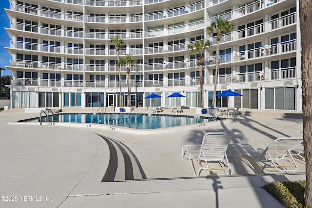 1601 Ocean Dr S Unit 410, Jacksonville Beach, FL 32250 - community pool with a patio area