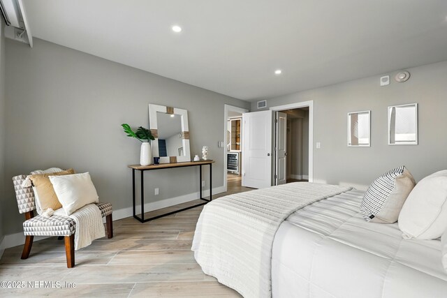 1601 Ocean Dr S Unit 410, Jacksonville Beach, FL 32250 - bedroom with light wood-style flooring, recessed lighting, and baseboards