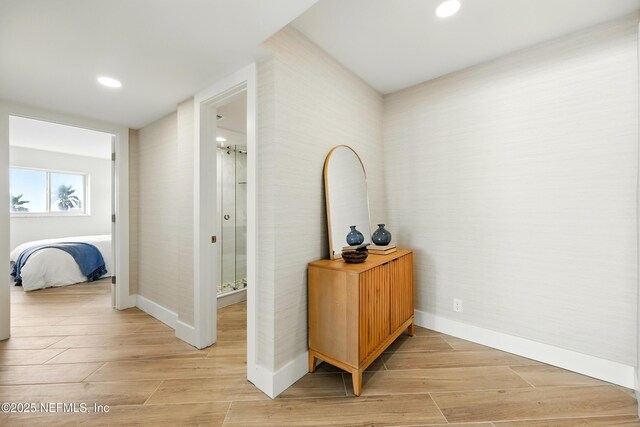 1601 Ocean Dr S Unit 410, Jacksonville Beach, FL 32250 - corridor featuring wood tiled floors, recessed lighting, and baseboards