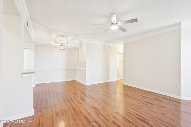 10435 Midtown Pkwy Unit 448, Jacksonville, FL 32246 - unfurnished room with light wood-style floors, ceiling fan, baseboards, and ornamental molding