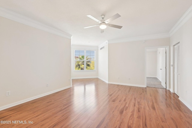 10435 Midtown Pkwy Unit 448, Jacksonville, FL 32246 - empty room featuring crown molding, ceiling fan, light wood-type flooring, visible vents, and baseboards