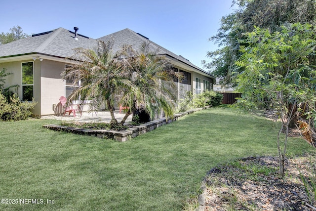1317 Honeysuckle Dr, Saint Johns, FL 32259 - exterior space with a patio, a yard, fence, and stucco siding
