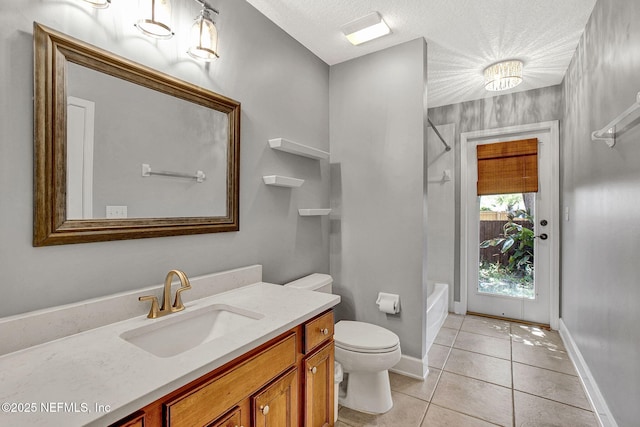 1317 Honeysuckle Dr, Saint Johns, FL 32259 - full bathroom with baseboards, toilet, shower / bathing tub combination, vanity, and tile patterned flooring