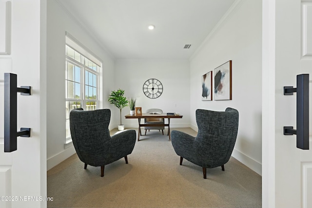 living area with visible vents, baseboards, carpet, and ornamental molding