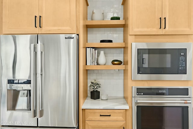 kitchen featuring decorative backsplash, stainless steel appliances, light countertops, and open shelves