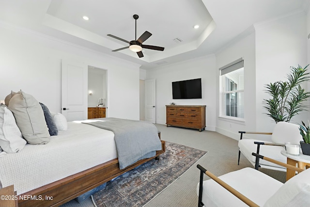 bedroom featuring visible vents, recessed lighting, ornamental molding, a raised ceiling, and light colored carpet