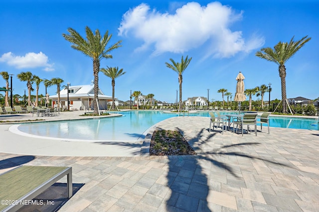 community pool with a patio