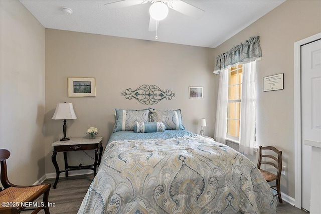 6738 White Blossom Cir Unit 36G, Jacksonville, FL 32258 - bedroom featuring baseboards, ceiling fan, and wood finished floors