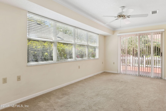 4532 Middleton Park Cir W, Jacksonville, FL 32224 - carpeted empty room with visible vents, baseboards, crown molding, and ceiling fan