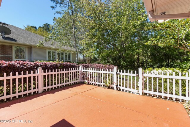 4532 Middleton Park Cir W, Jacksonville, FL 32224 - view of patio / terrace featuring fence