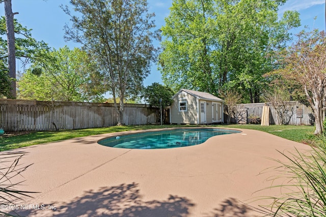 2795 Kiowa Ave, Orange Park, FL 32065 - view of pool featuring a fenced backyard, a lawn, an outbuilding, and a patio area